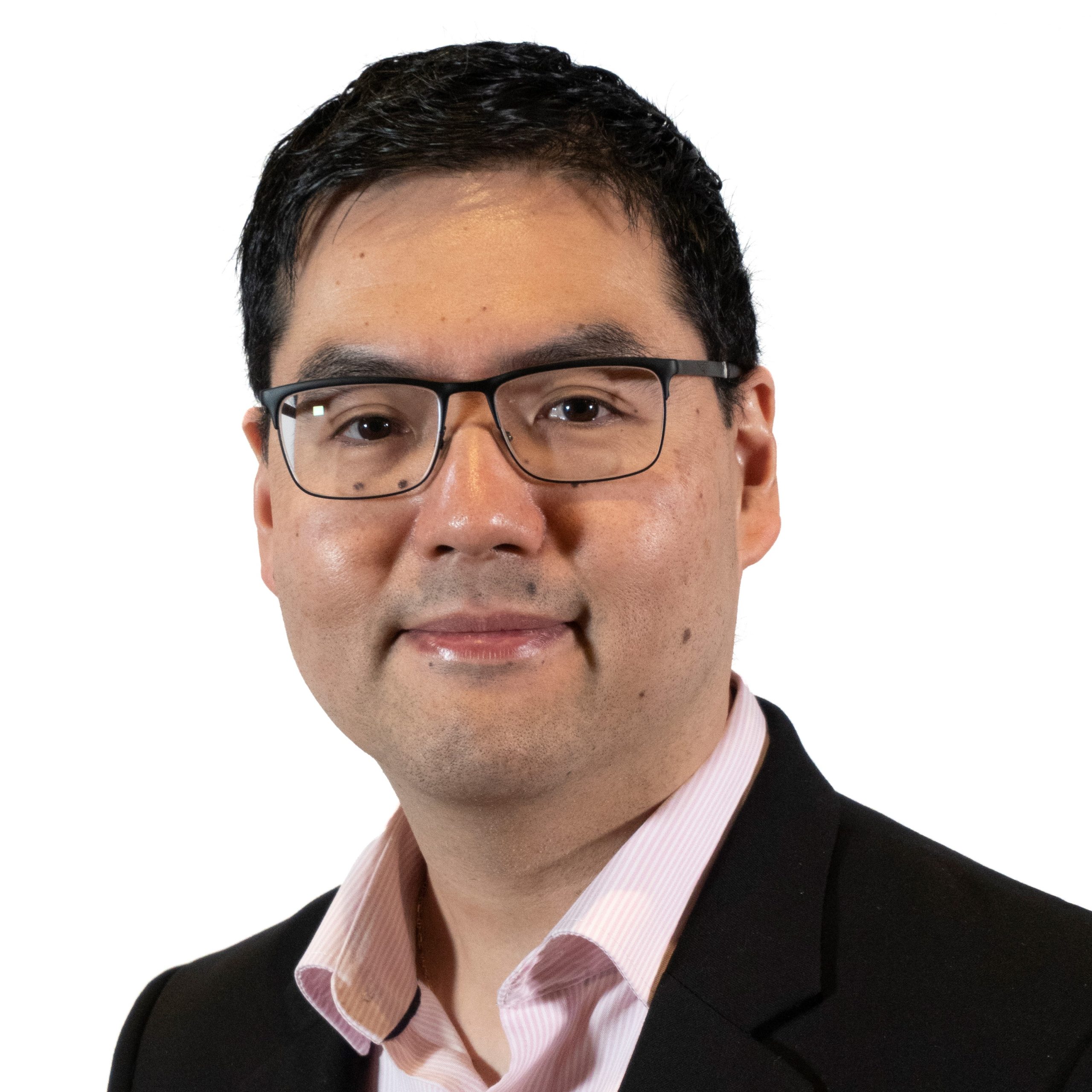 Headshot of a middle-aged male with black short hair smiling, wearing glasses and a black blazer with a light pink shirt.