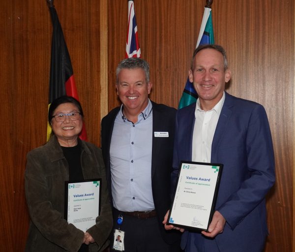 CEO Brendon Garner standing between the two Values Awards winners Siew Yeak and Dr Chris Brown