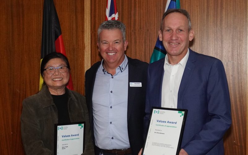 CEO Brendon Garner standing between the two Values Awards winners Siew Yeak and Dr Chris Brown