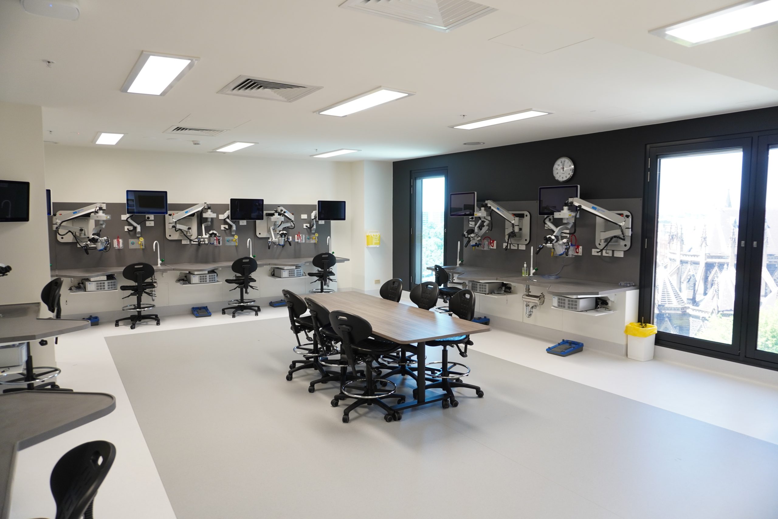 Surgical Skills Lab featuring a long meeting table and 9 workstations