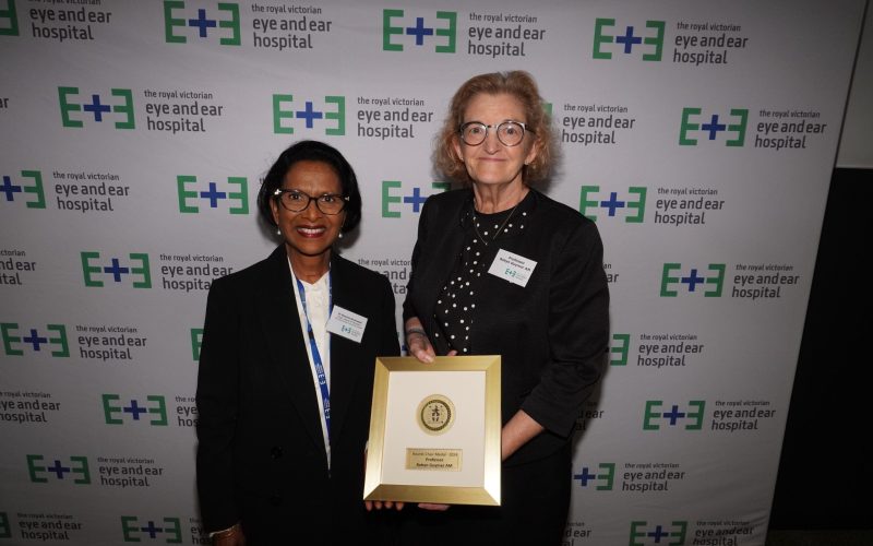 Dr Shrene Devanesen standing next to professor Robyn Guymer AM who holds the Board Chairs Medal