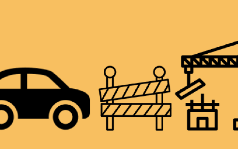 Orange banner with a silhouette of a car, a barricade and a crane