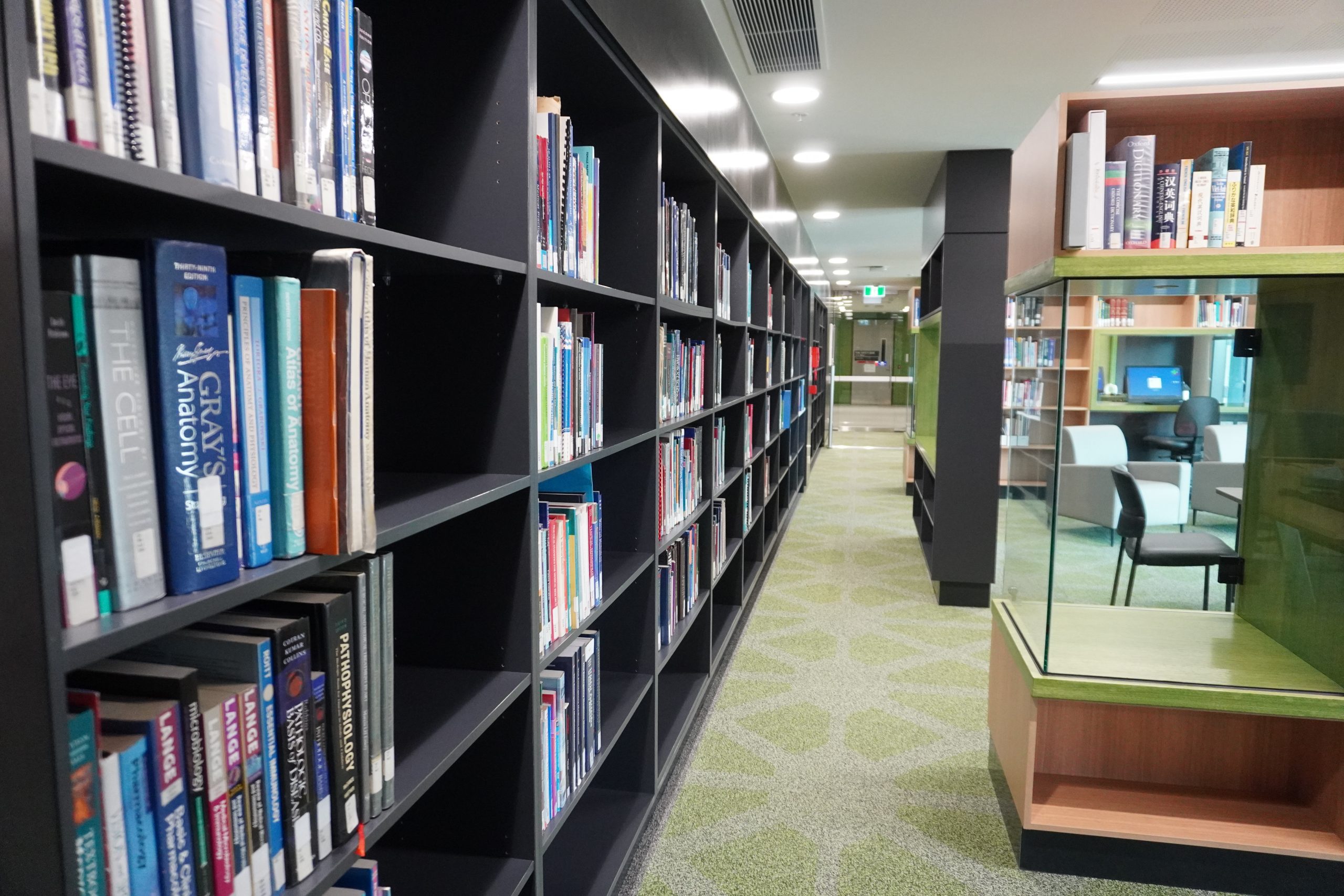 An image of library shelves filled with books