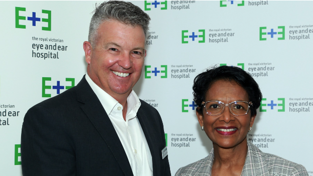 An image of CEO Brendon Gardner in a black suit jacket and white shirt, with our outgoing Board Chair Dr Sherene Devanesen AM in a tartan jacket.
