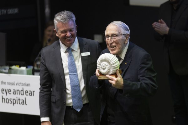 CEO Brendon Gardner presenting Professor Graeme Clark with a shell to commemorate his contribution to the hospital.