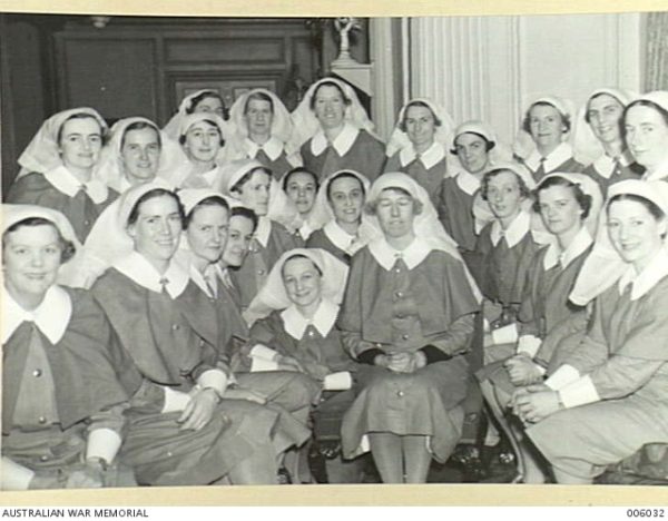 A black and white photo of a group of nurses in their uniform during World War Two. Matron Frances John is in the middle