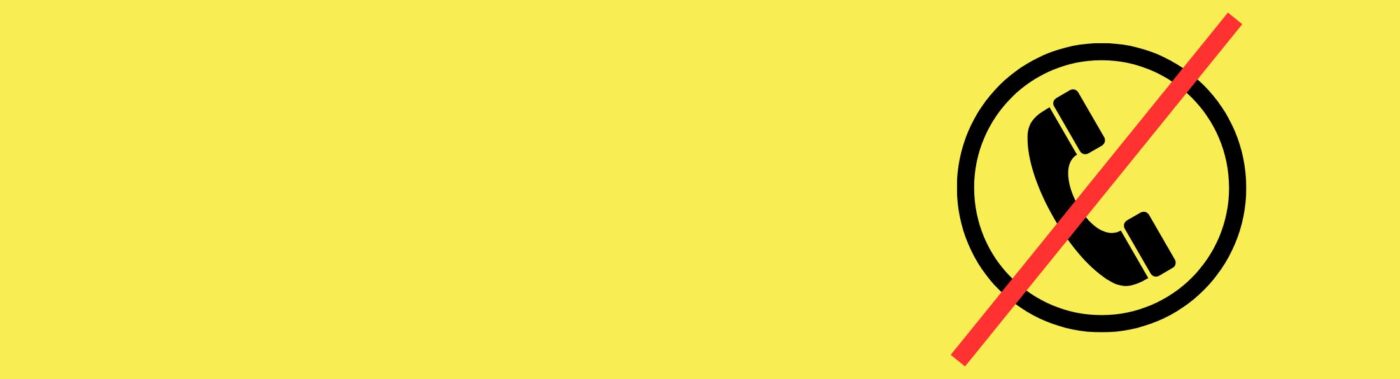 Yellow tile with a graphic of a black phone with a red line crossed through it.